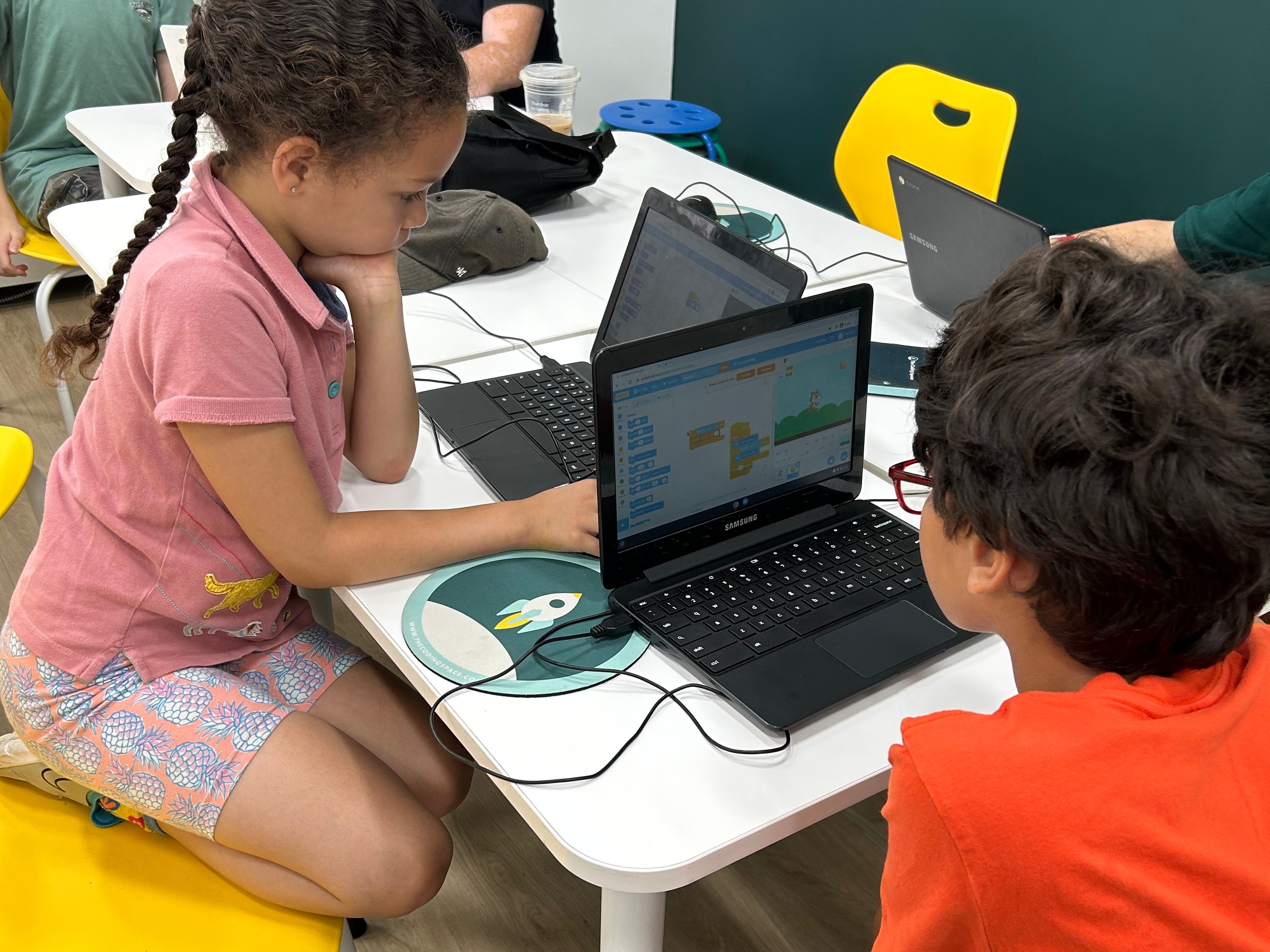 Students coding in a classroom