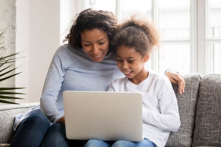 Family looking at computer